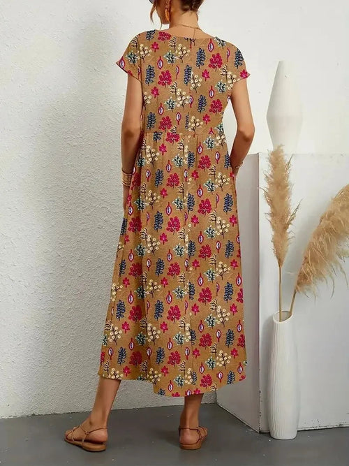 https://cdn.shopify.com/s/files/1/0894/1948/1459/files/A-Line_Summer_Dress_for_Women__Elegant_Floral_Design_1.jpg?v=1760530290