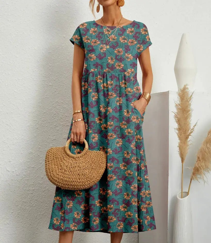 https://cdn.shopify.com/s/files/1/0894/1948/1459/files/A-Line_Summer_Dress_for_Women__Elegant_Floral_Design_9.jpg?v=1760530306