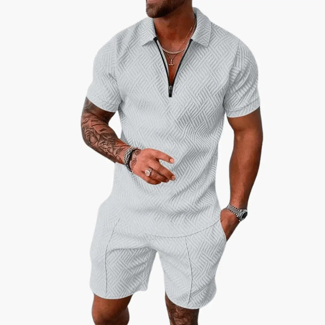 https://cdn.shopify.com/s/files/1/0980/8547/0533/files/Men_sZipPoloTwo-PieceSet_ShortSleeveShirtandMatchingShorts_6.jpg?v=1777385270