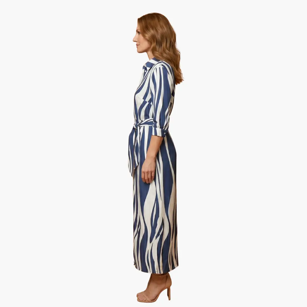 https://cdn.shopify.com/s/files/1/0980/8547/0533/files/Striped_Shirt_Dress_Women_s_Maxi_Dress_Made_of_Cotton_3.png?v=1777384977