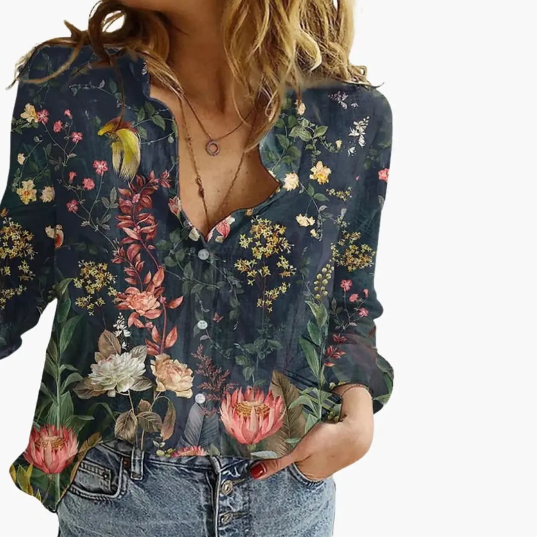 https://cdn.shopify.com/s/files/1/0980/8547/0533/files/Women_sArtisticPrintV-NeckBlouse_LongSleeveTop_1.jpg?v=1777384440