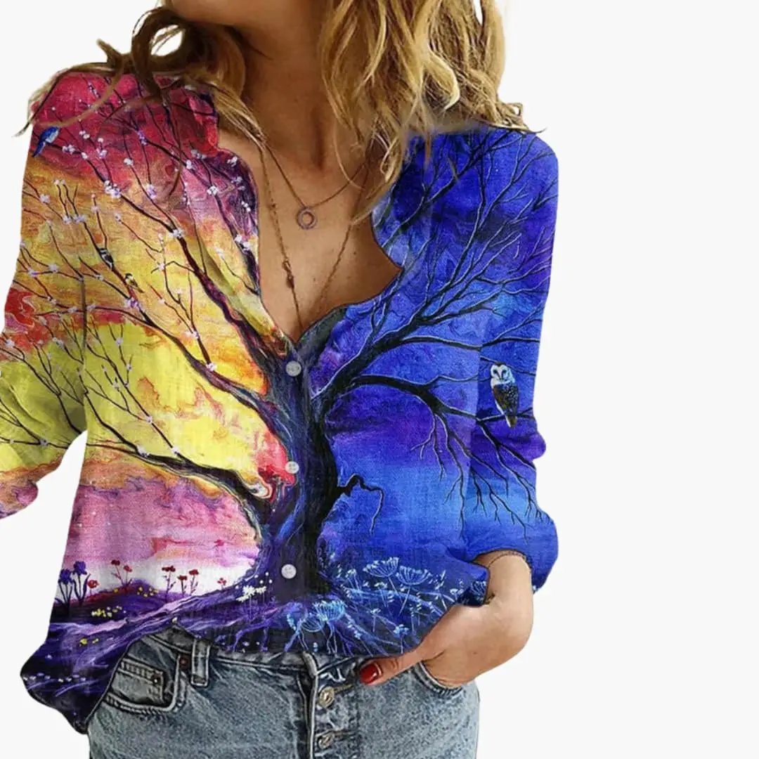 https://cdn.shopify.com/s/files/1/0980/8547/0533/files/Women_sArtisticPrintV-NeckBlouse_LongSleeveTop_10.jpg?v=1777384440