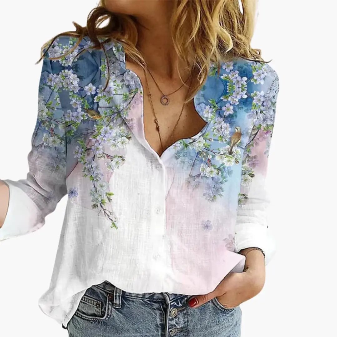 https://cdn.shopify.com/s/files/1/0980/8547/0533/files/Women_sArtisticPrintV-NeckBlouse_LongSleeveTop_11.jpg?v=1777384440