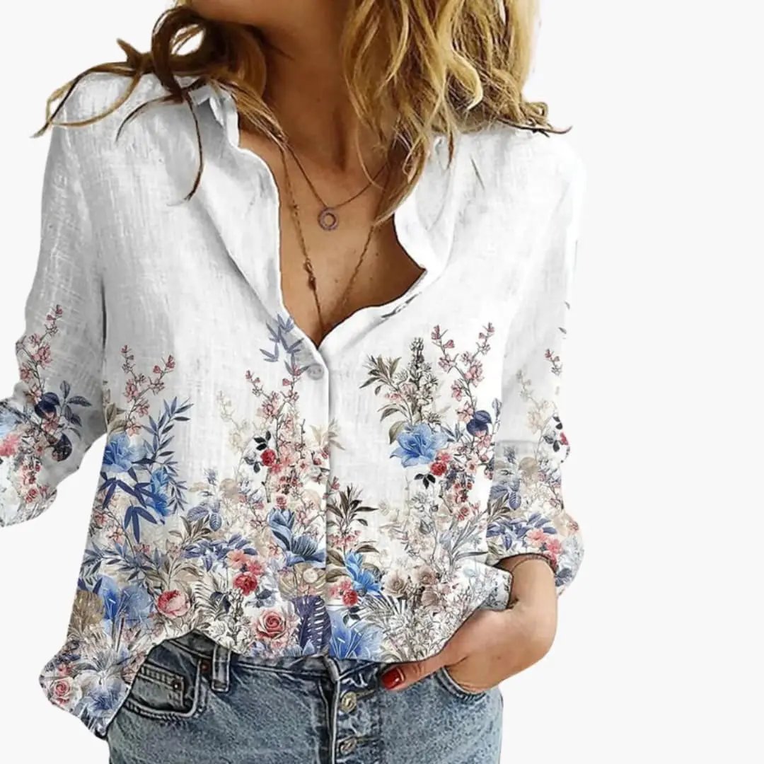 https://cdn.shopify.com/s/files/1/0980/8547/0533/files/Women_sArtisticPrintV-NeckBlouse_LongSleeveTop_12.jpg?v=1777384440