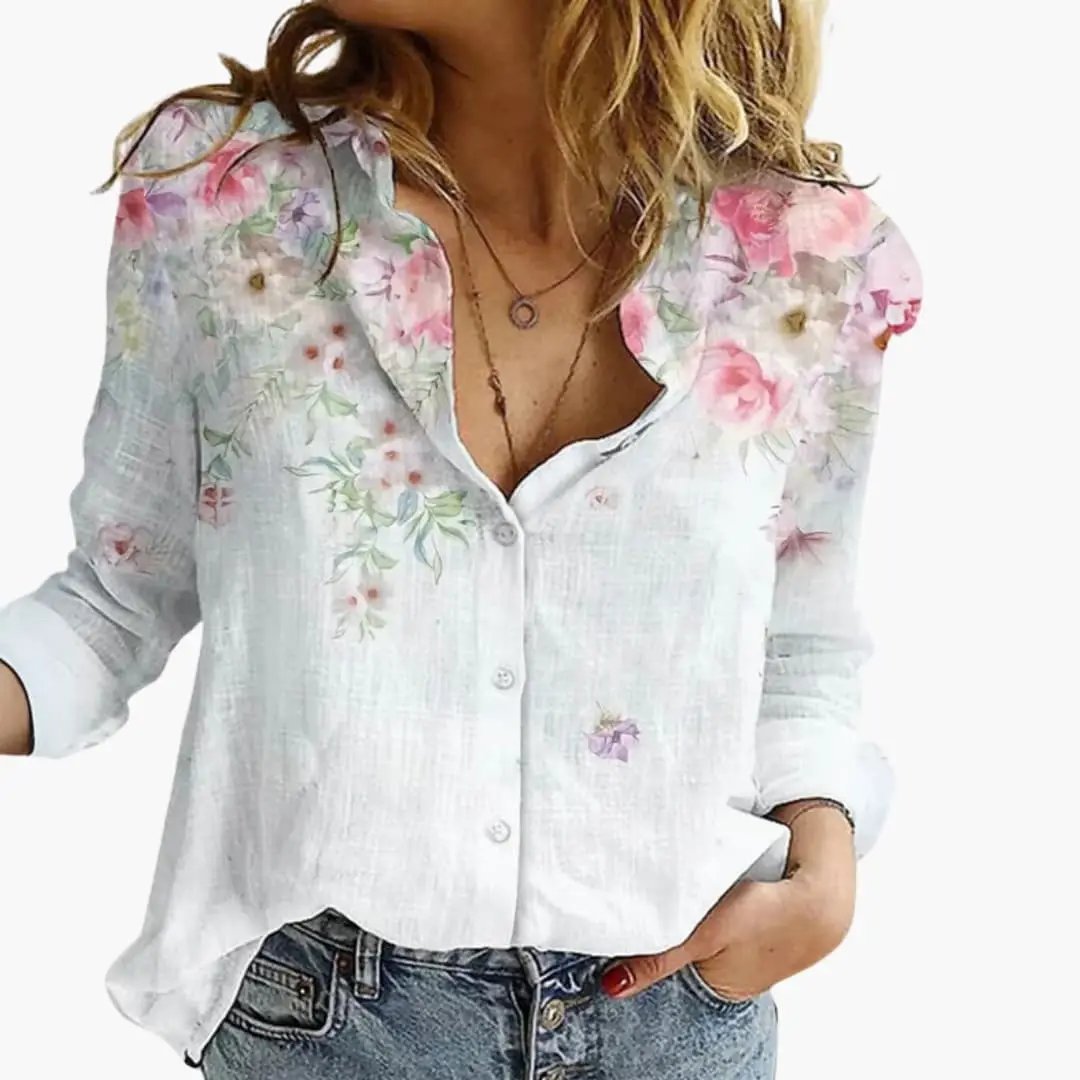 https://cdn.shopify.com/s/files/1/0980/8547/0533/files/Women_sArtisticPrintV-NeckBlouse_LongSleeveTop_2.jpg?v=1777384440