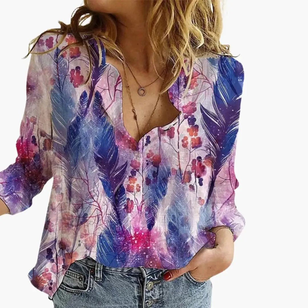 https://cdn.shopify.com/s/files/1/0980/8547/0533/files/Women_sArtisticPrintV-NeckBlouse_LongSleeveTop_8.jpg?v=1777384440