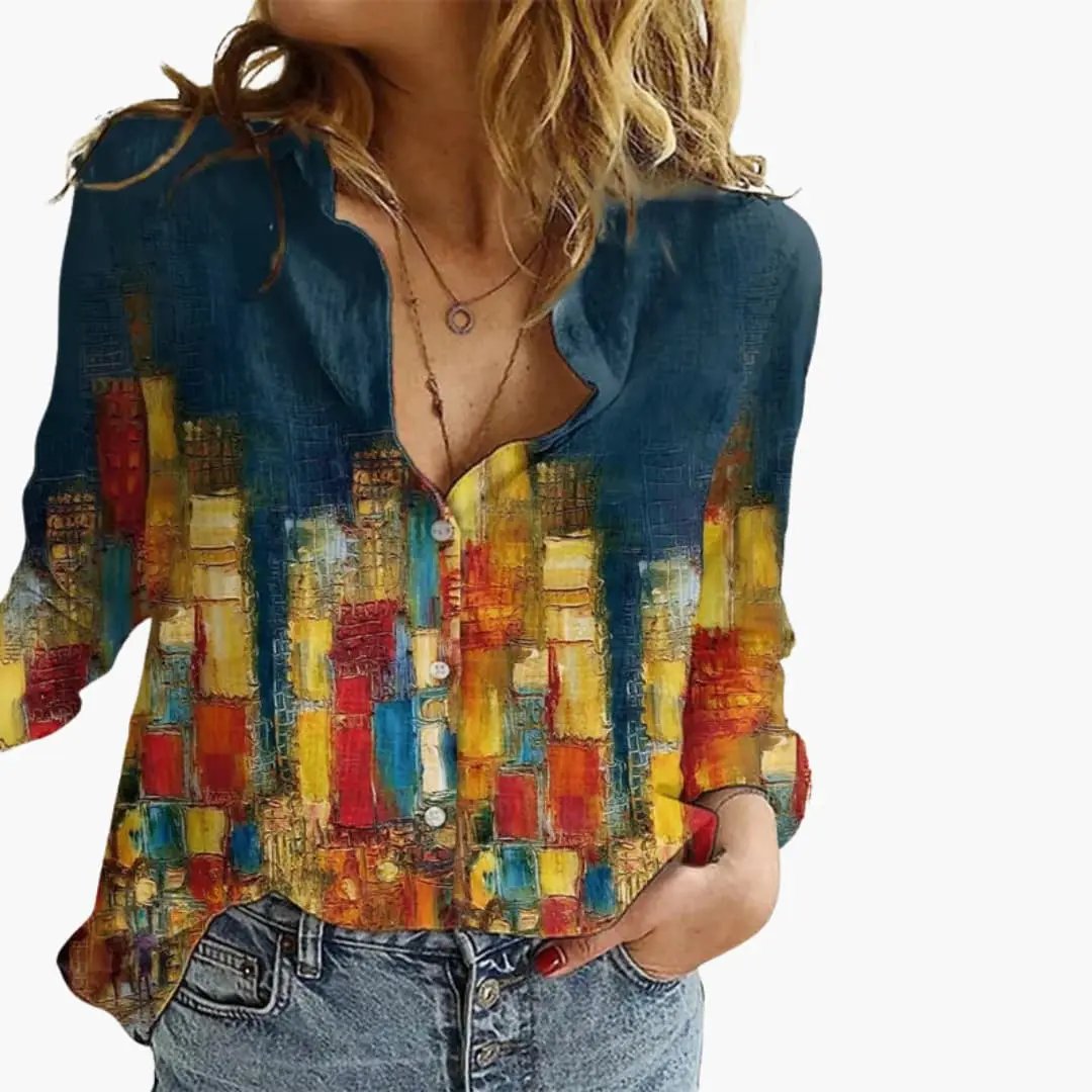 https://cdn.shopify.com/s/files/1/0980/8547/0533/files/Women_sArtisticPrintV-NeckBlouse_LongSleeveTop_9.jpg?v=1777384440