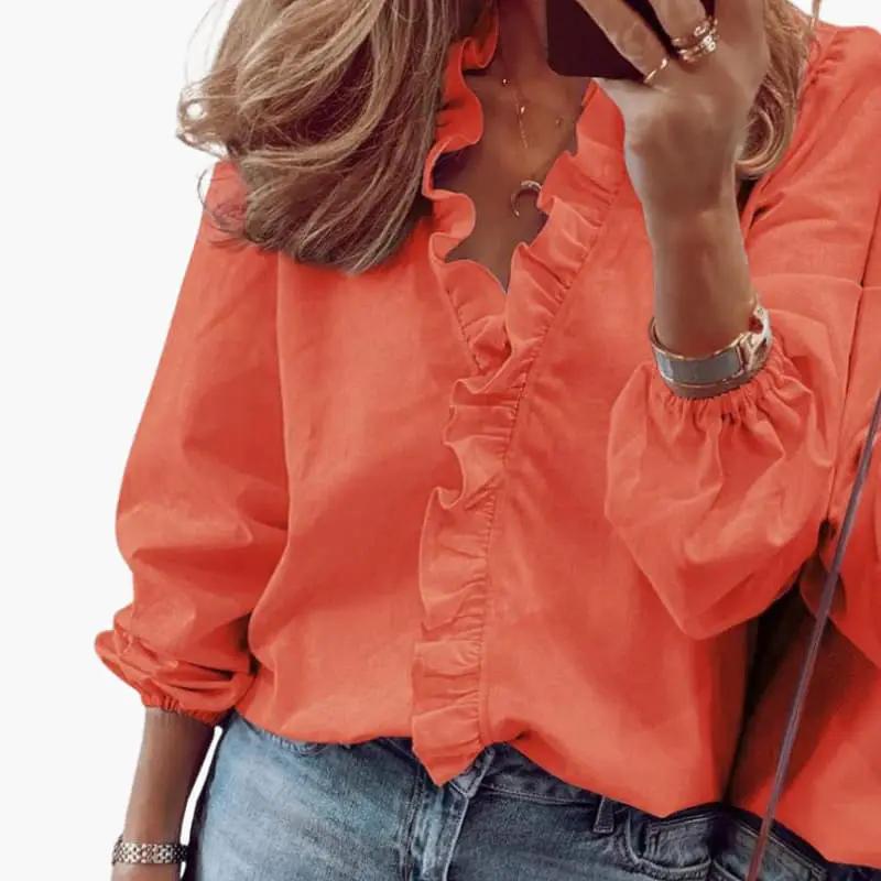 https://cdn.shopify.com/s/files/1/0980/8547/0533/files/Women_sBlousewithV-NecklineandRuffleDetail_3.jpg?v=1777385706