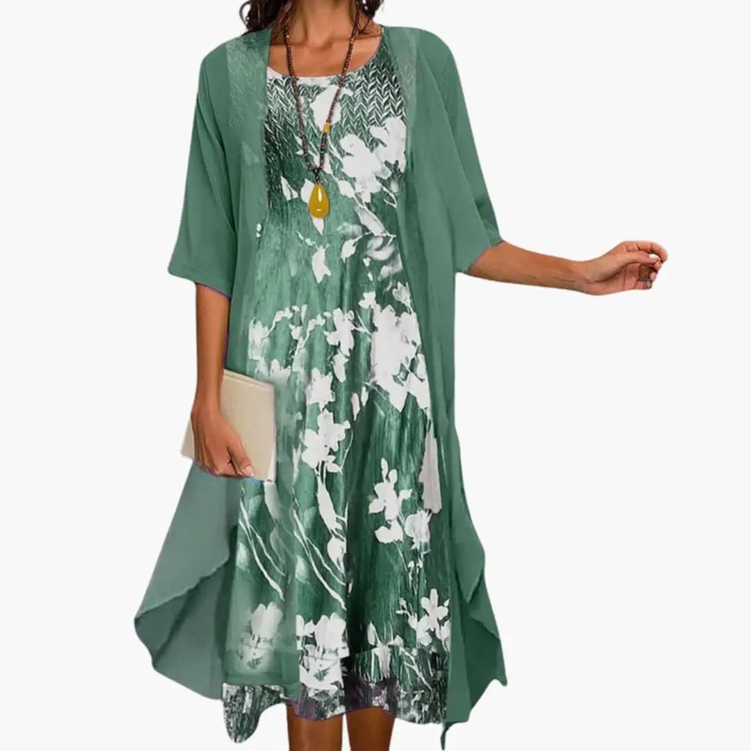 https://cdn.shopify.com/s/files/1/0980/8547/0533/files/Women_sFloralLongDresswithCardiganSet_1.jpg?v=1777384493