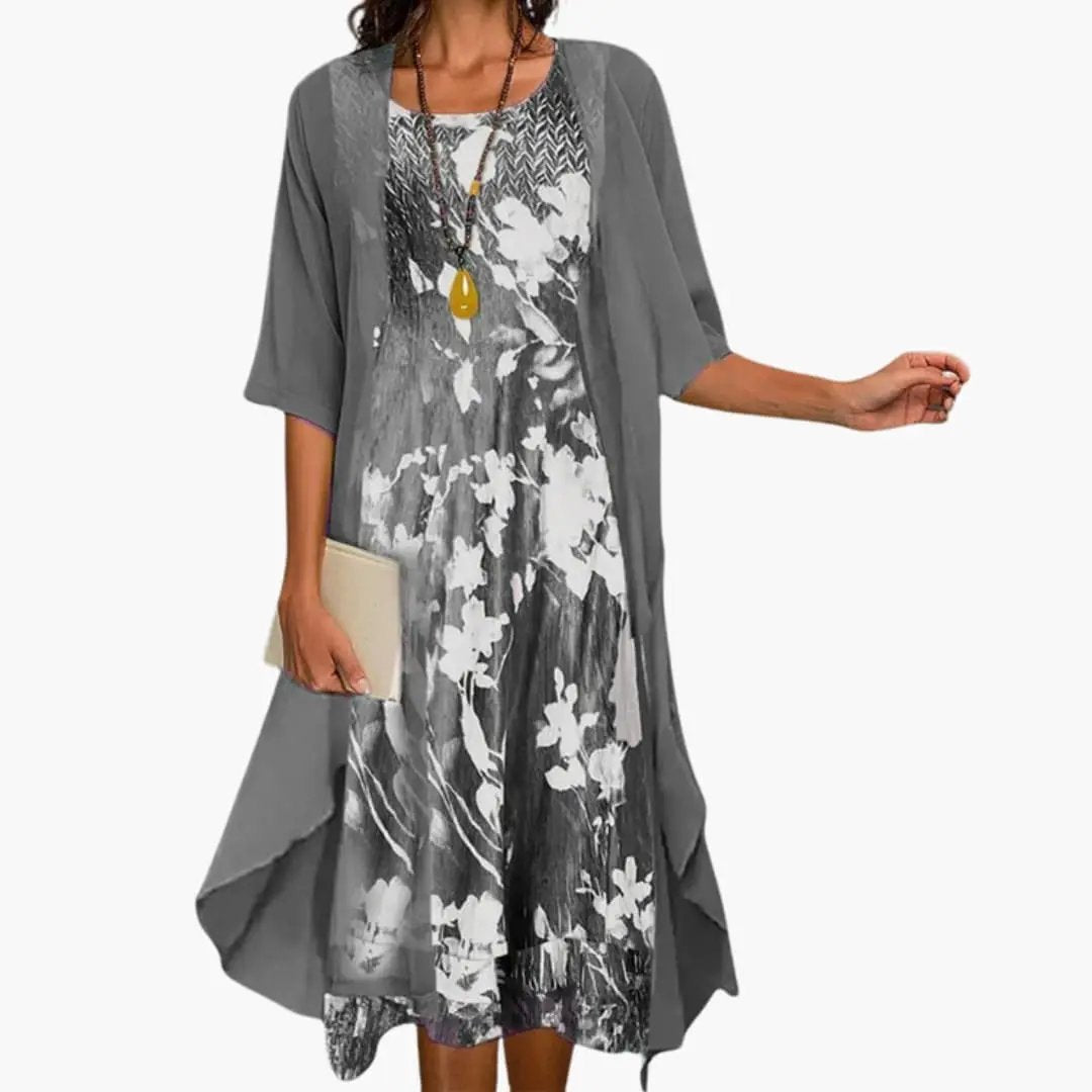 https://cdn.shopify.com/s/files/1/0980/8547/0533/files/Women_sFloralLongDresswithCardiganSet_2.jpg?v=1777384493