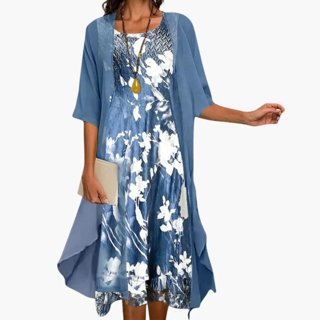 https://cdn.shopify.com/s/files/1/0980/8547/0533/files/Women_sFloralLongDresswithCardiganSet_3.jpg?v=1777384493