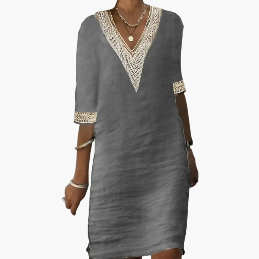 https://cdn.shopify.com/s/files/1/0980/8547/0533/files/Women_sKnee-LengthDresswithRoundNeckandShortSleeves_2.jpg?v=1777384890