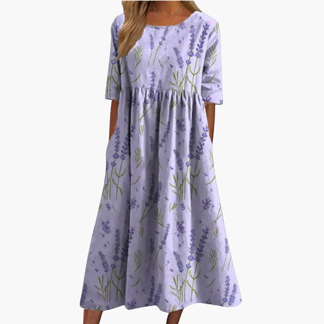 https://cdn.shopify.com/s/files/1/0980/8547/0533/files/Women_sPrintedMidiDress_ShortSleeveLooseFitSummerDress_8.jpg?v=1777384602