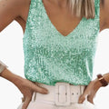https://cdn.shopify.com/s/files/1/0980/8547/0533/files/Women_sSleevelessTop_SequinDetail_RoundNeckline_LightweightBreathableFabric_CasualFit_1.jpg?v=1777384749