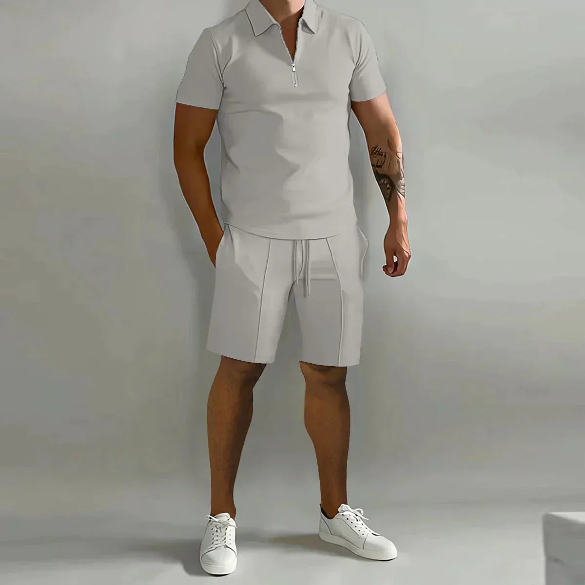 https://cdn.shopify.com/s/files/1/0811/5545/7372/files/Zomer-Dunne-Poloshirt-Met-Korte-Mouwen-Sport-Shorts-2-Stuk-Nieuw-Heren-Trainingspak-Heren-Effen-Set.jpg_Q90.jpg__1.webp?v=1745327886
