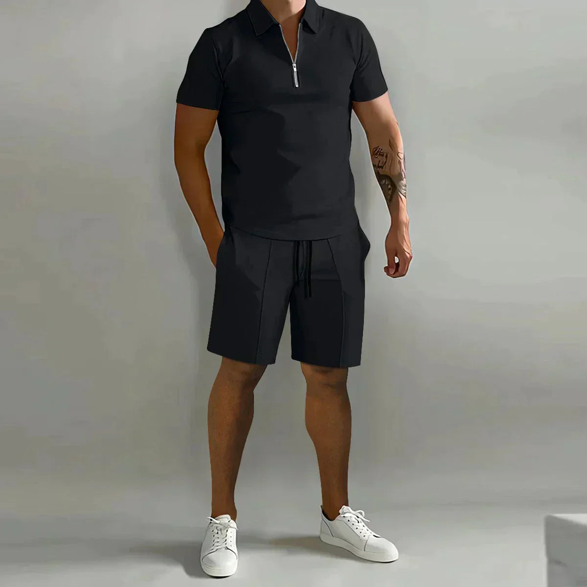 https://cdn.shopify.com/s/files/1/0811/5545/7372/files/Zomer-Dunne-Poloshirt-Met-Korte-Mouwen-Sport-Shorts-2-Stuk-Nieuw-Heren-Trainingspak-Heren-Effen-Set.jpg_Q90.jpg__2.webp?v=1745327886