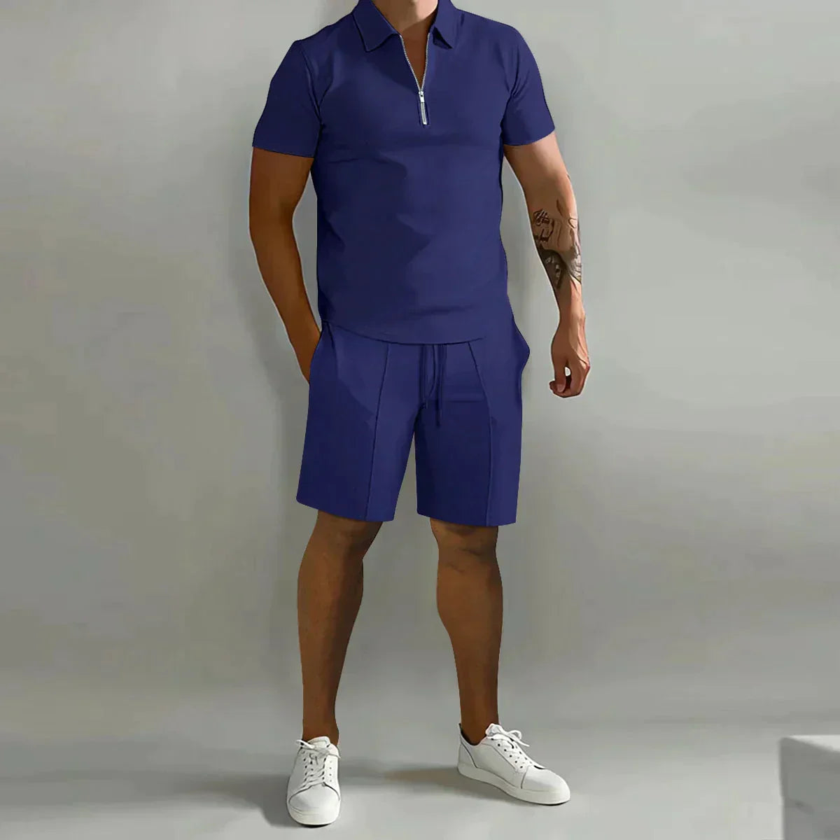 https://cdn.shopify.com/s/files/1/0811/5545/7372/files/Zomer-Dunne-Poloshirt-Met-Korte-Mouwen-Sport-Shorts-2-Stuk-Nieuw-Heren-Trainingspak-Heren-Effen-Set.jpg_Q90.jpg__3.webp?v=1745327887
