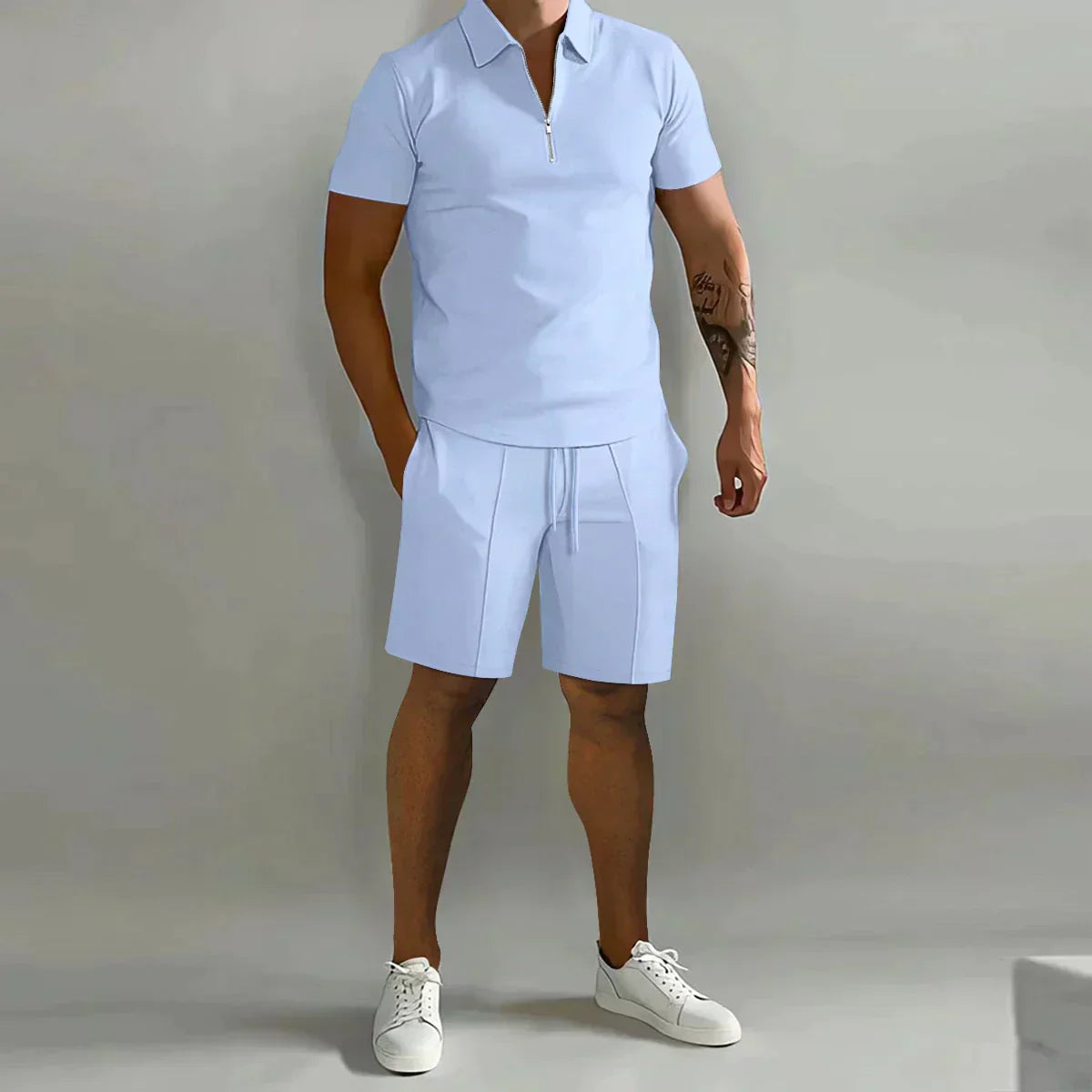 https://cdn.shopify.com/s/files/1/0811/5545/7372/files/Zomer-Dunne-Poloshirt-Met-Korte-Mouwen-Sport-Shorts-2-Stuk-Nieuw-Heren-Trainingspak-Heren-Effen-Set_jpg_Q90_jpg.webp?v=1745327886