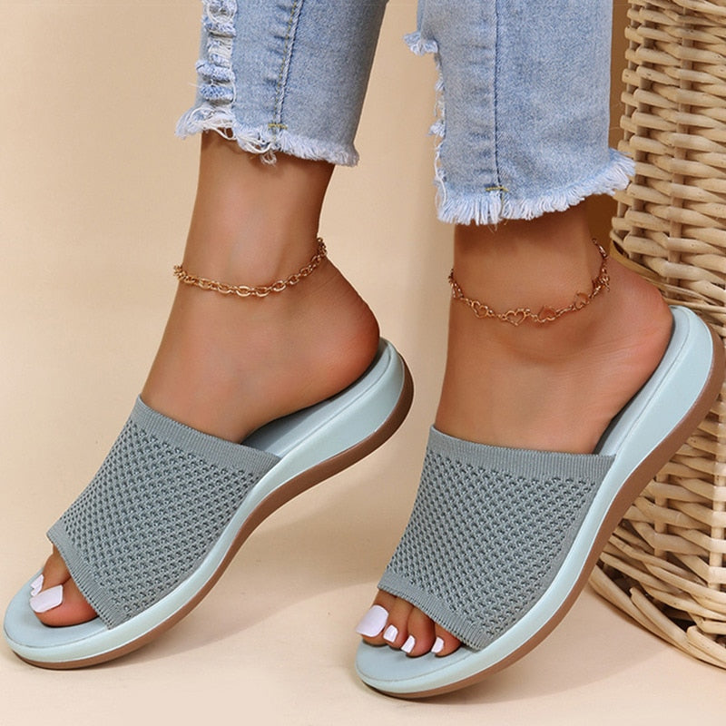 https://cdn.shopify.com/s/files/1/0902/1236/8707/files/womens-light-blue-breathable-orthopaedic-sliders.jpg?v=1751440917
